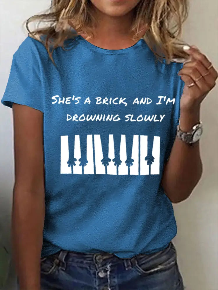 Women’s She’s a brick and I’m drowning slowly lyrics T-shirt Blue / S