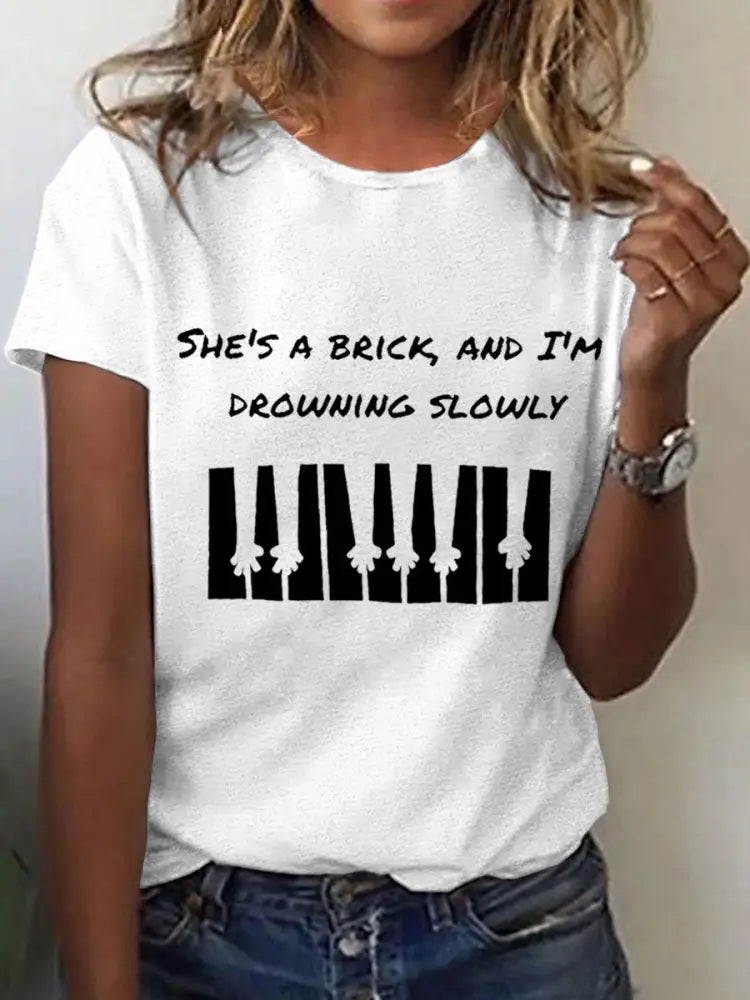 Women’s She’s a brick and I’m drowning slowly lyrics T-shirt White / S